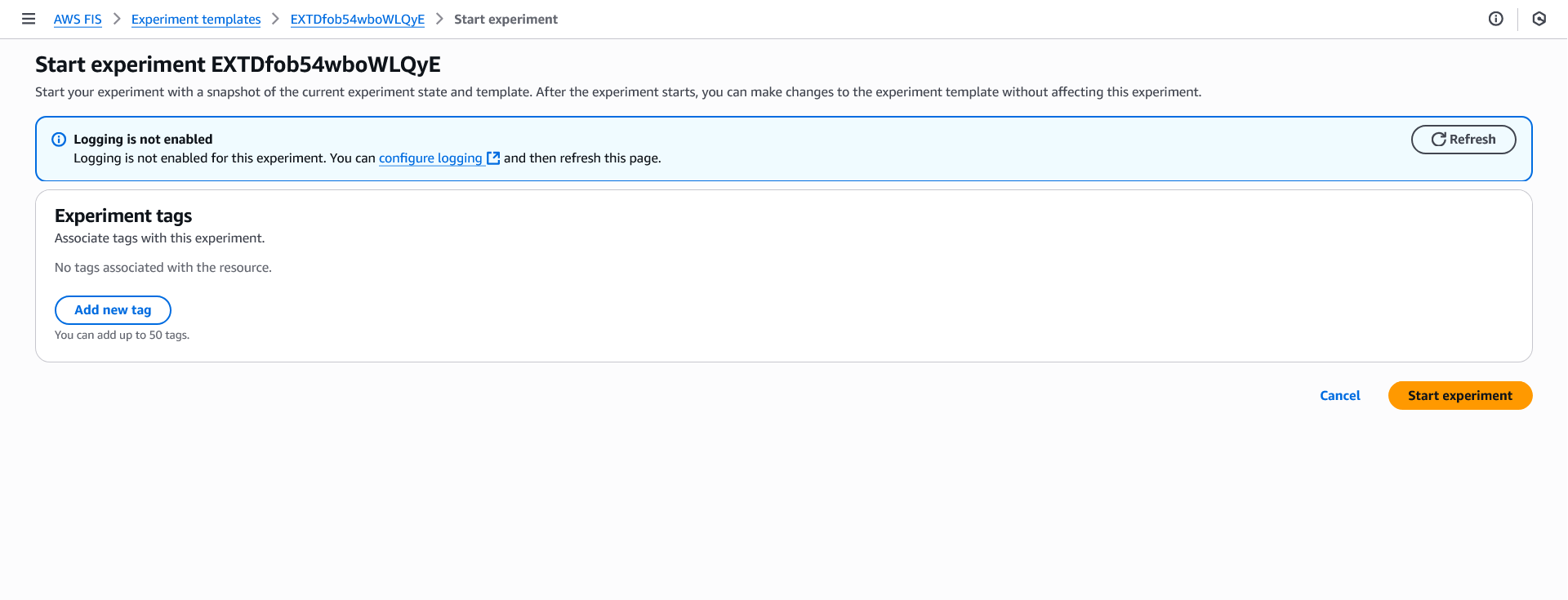 AWS Fault Injection Service interface showing the 'Start experiment' page for experiment EXTDfob54wboWLQyE. The page displays that logging is not enabled, with an option to configure it, and shows that no tags are associated with the resource. At the bottom are 'Cancel' and 'Start experiment' buttons.
